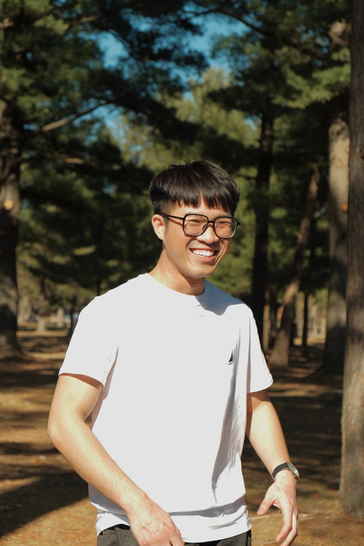 Andrew Vu smiling outdoors